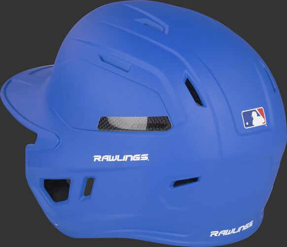 Back left of a matte royal CAR07A MACH Carbon baseball helmet with air vents in the back