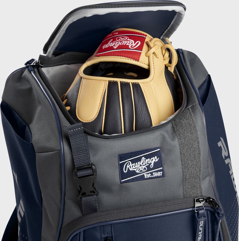 A Rawlings baseball glove in the top compartment of a Franchise baseball backpack - SKU: FRANBP-N