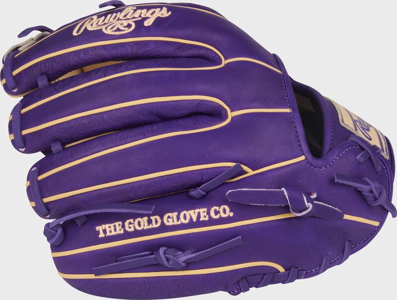 Purple back of a Heart of the Hide 11.75-Inch Purple Infield Glove with the MLB logo on the pinky