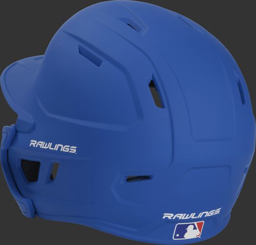 Back left view of a matte royal MACHEXTR MACH series batting helmet with air vents