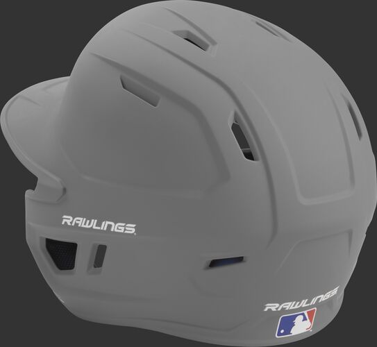 Back left view of a matte silver MACH series batting helmet with air vents