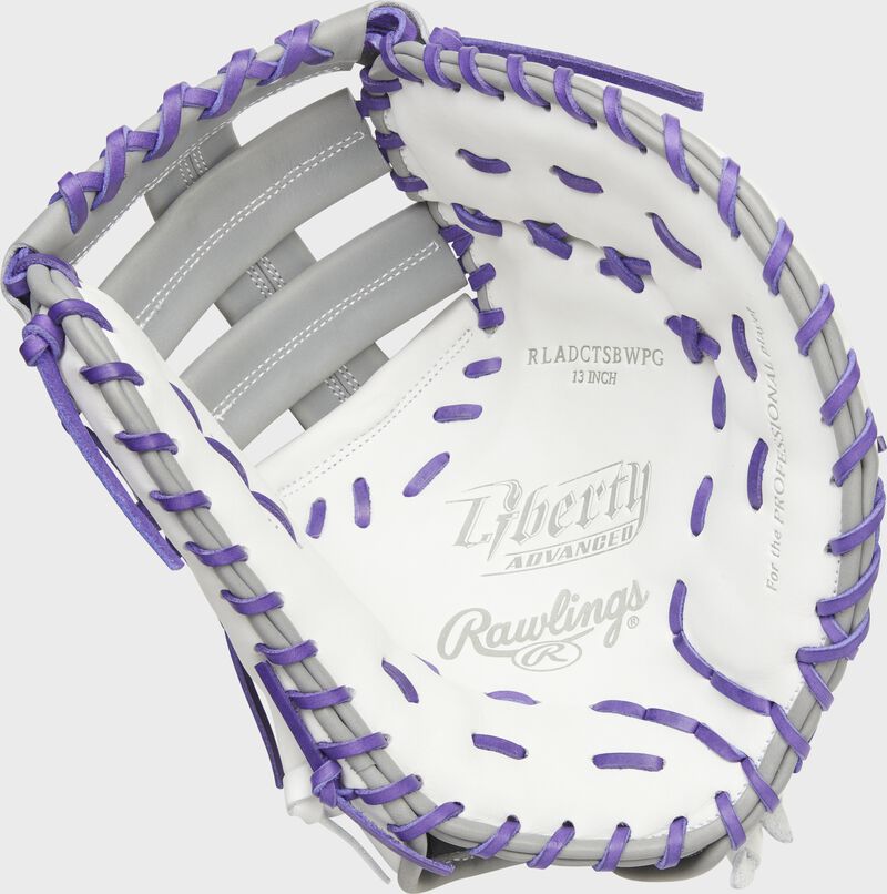 White palm of a Rawlings Liberty Advanced Color Series 1st base mitt with purple laces - SKU: RLADCTSBWPG
