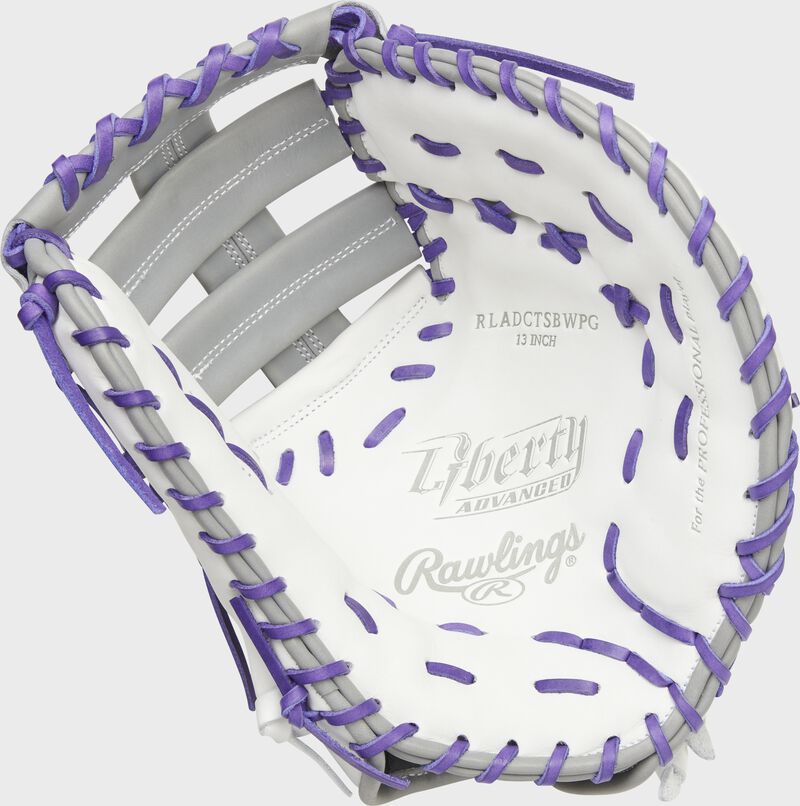 White palm of a Rawlings Liberty Advanced Color Series 1st base mitt with purple laces - SKU: RLADCTSBWPG loading=