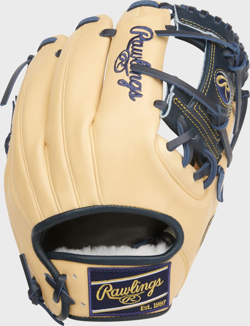 Back of a camel Anthony Volpe Pro Preferred 11.5-Inch Infield Glove with a navy Rawlings patch