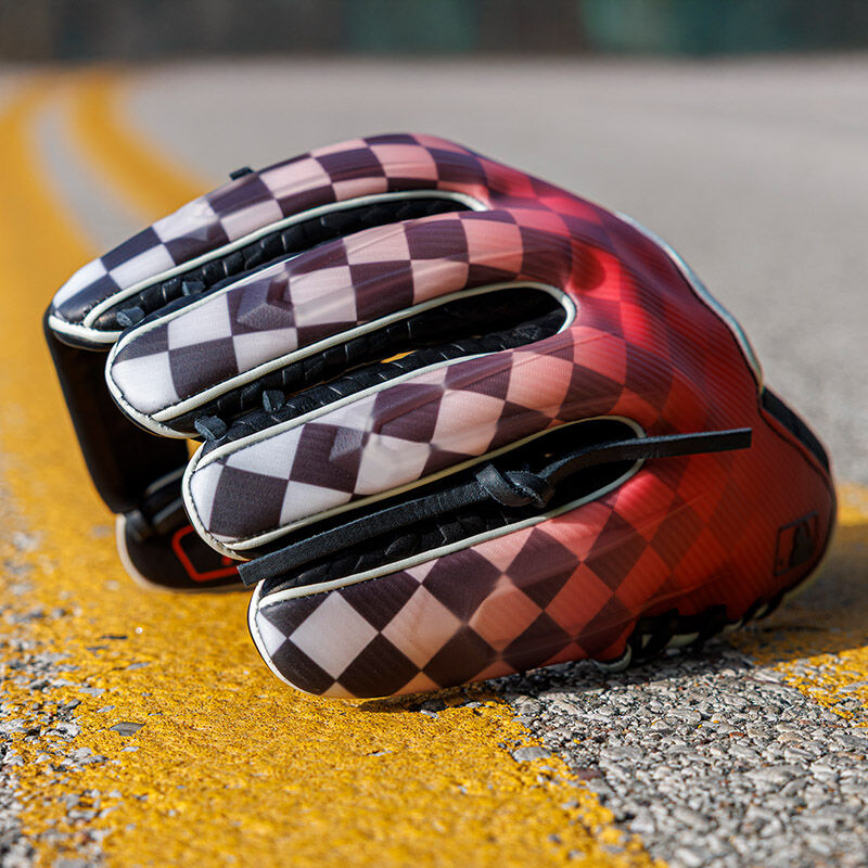 Picture of the back of a REV1X Checkered Flag infield glove on the yellow lines of a road