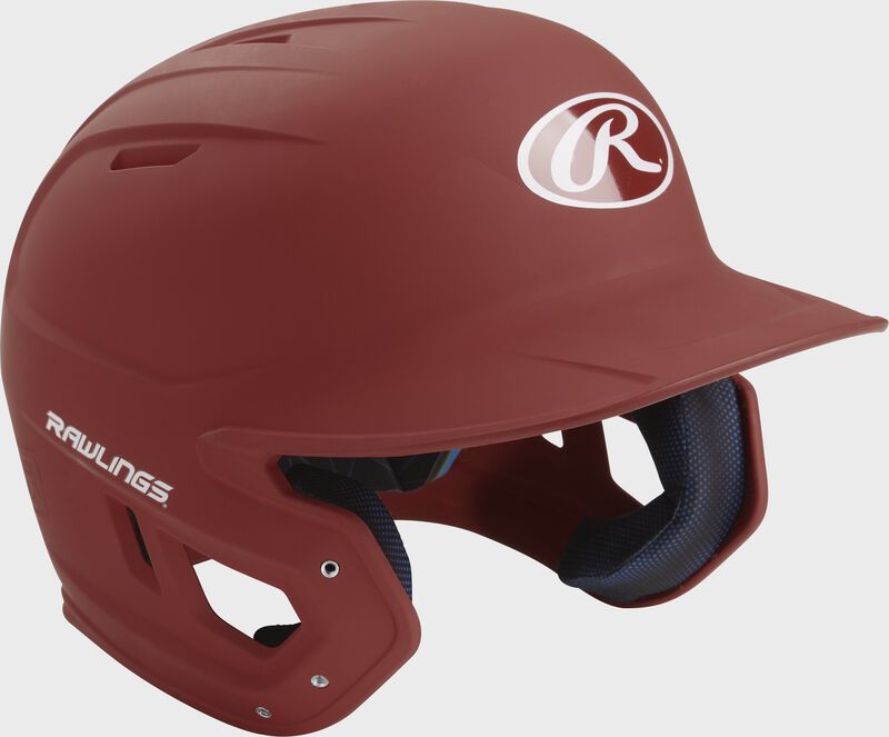 Right angle view of a matte MACH batting helmet with a cardinal shell
