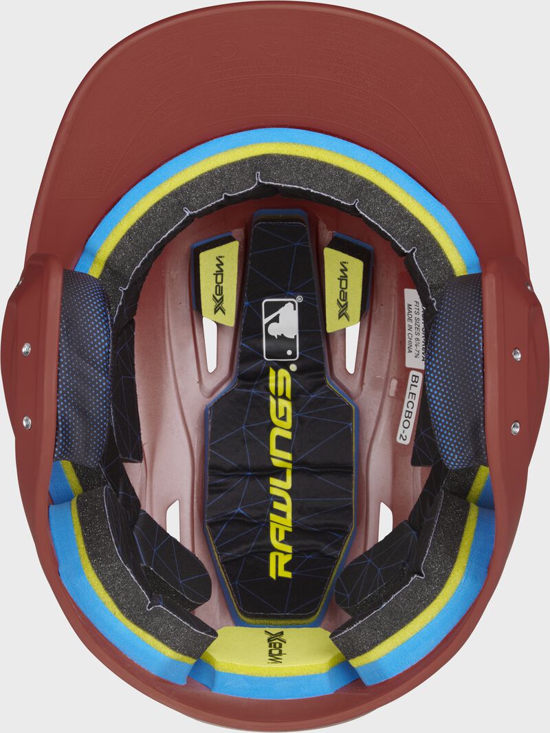 Inside of a Rawlings MACH baseball helmet with IMPAX durable foam padding