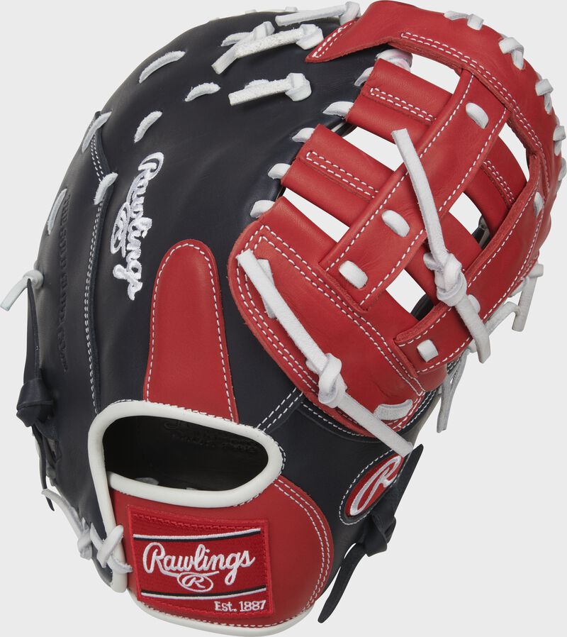 Navy back of a Breakout 12-Inch youth 1st base mitt with a red Rawlings patch - SKU: RSGBOYPTFM16NS