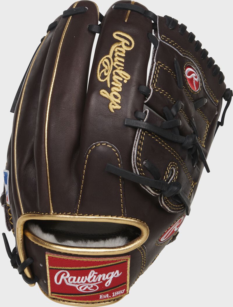 Mocha back of a Gold Glove 2-piece solid web with a red Rawlings patch - SKU: RGG1200KMOPRO