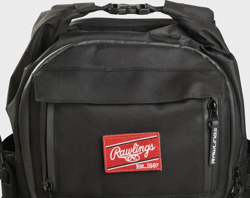 Top front of a black CEO backpack with a Red Rawlings patch and the clips on top - SKU: CEOBP-B