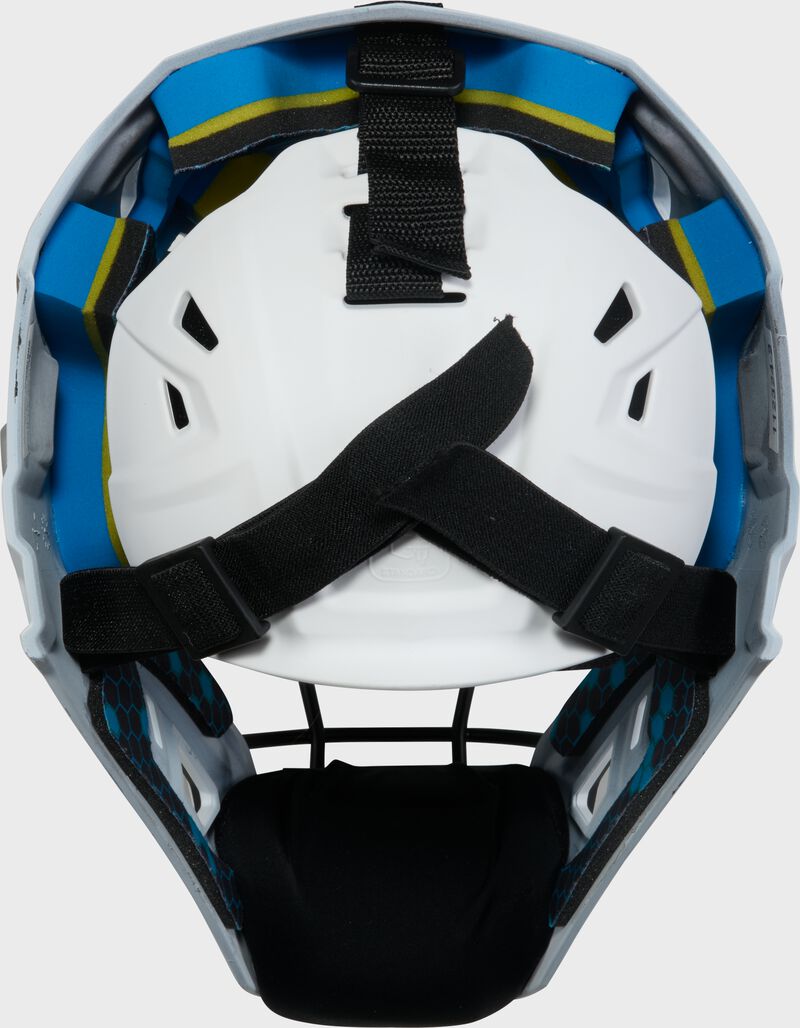 Back of a white Rawlings Mach Pro Series catcher's helmet loading=