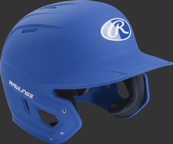 Right angle view of a matte MACH Senior batting helmet with a royal shell
