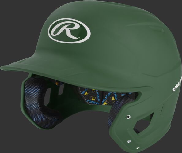 Left angle view of a dark green MCH07A Mach high school/college batting helmet