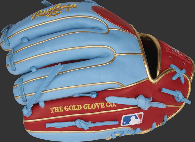 Back of a columbia blue/scarlet Kolten Wong Heart of the Hide glove with the MLB logo on the pinky - SKU: RSGPRO314-7SCB
