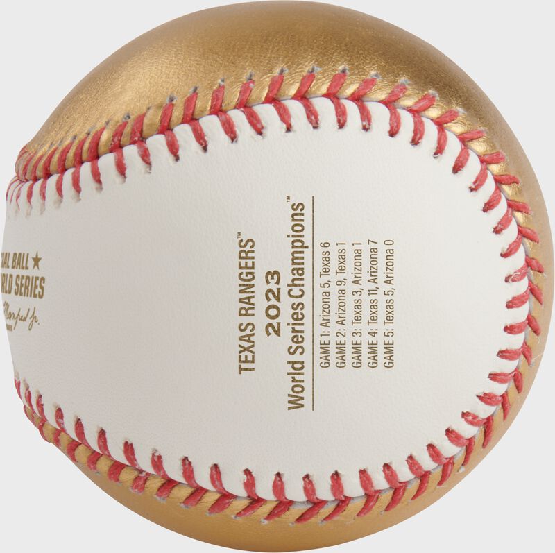 A gold stamp with the scores from each game on a Texas Rangers World Series Champions baseball