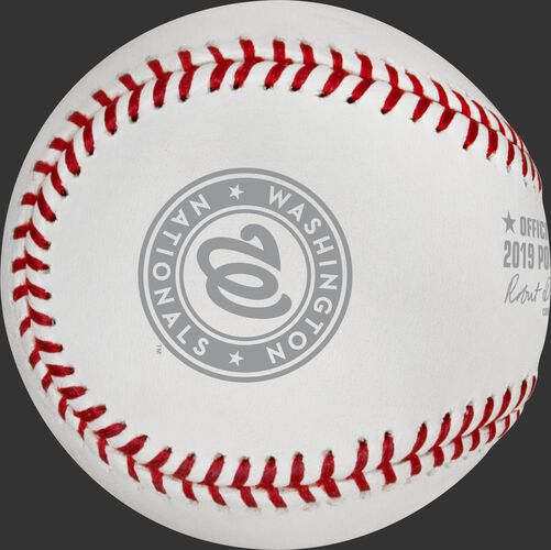 A grey Washington Nationals logo stamped on a NLCS19CHMP Washington Nats' NLCS Champions baseball