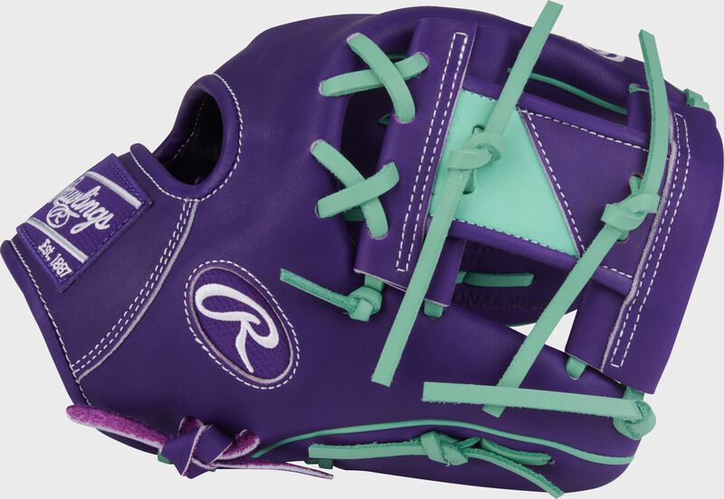 Thumb of a Heart of the Hide 11.5-Inch Purple Infield Glove with a purple/mint 2-tone Pro I-web