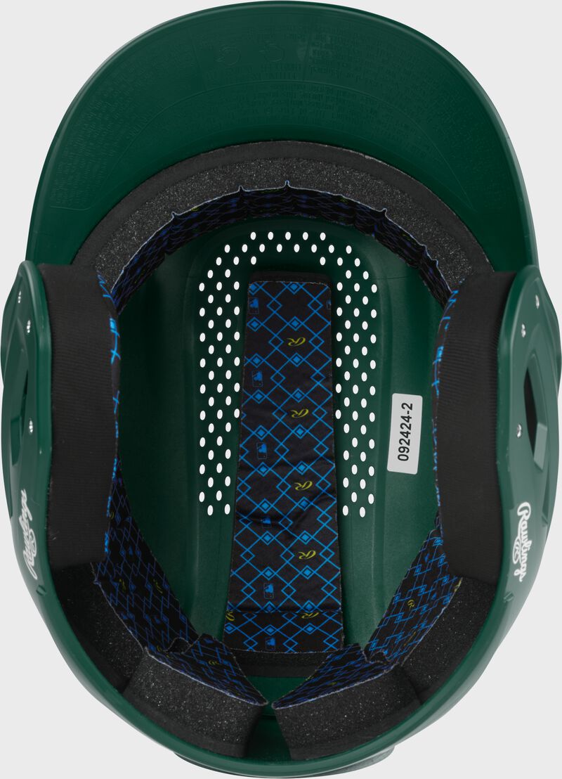 Inside padding of a dark green Rawlings RX2 batting helmet loading=