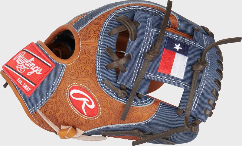 Thumb of a Heart of the Hide 2024 MLB All-Star Game Glove with the Texas flag on a navy I-web