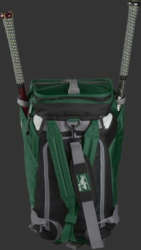 A dark green R601 Rawlings Hybrid duffel/backpack standing up with two bats