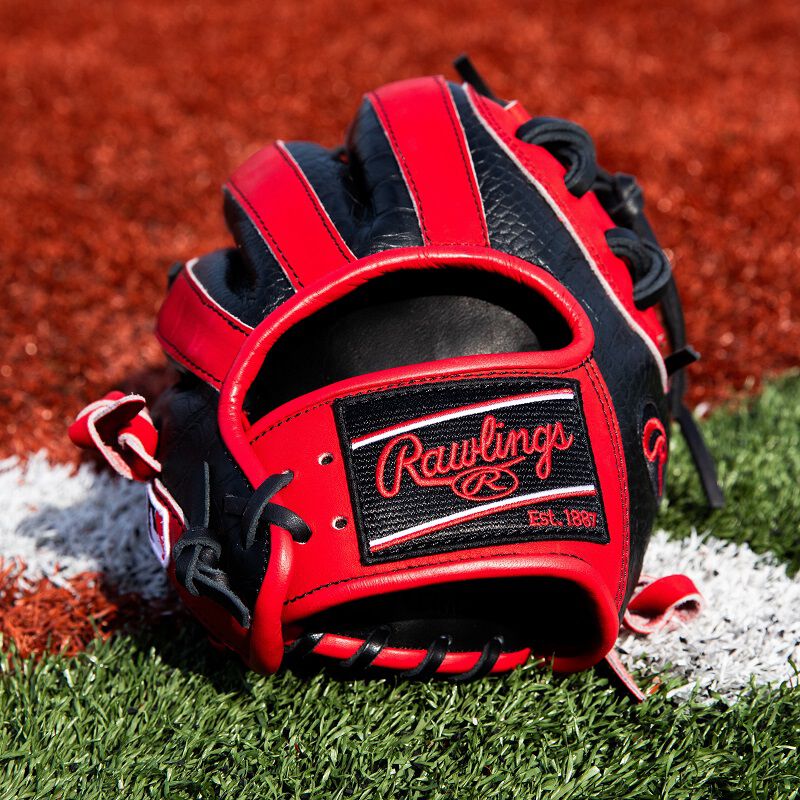 Black Rawlings patch on the wrist of a Heart of the Hide ColorSync 8.0 glove on a field