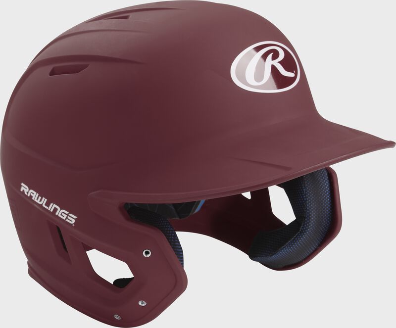 Right angle view of a matte MACH batting helmet with a maroon shell