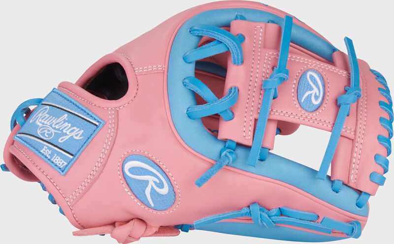 Thumb of a pink/Columbia blue Rawlings NXT Series 11.5-Inch Infield Glove with a pink Pro I-web loading=