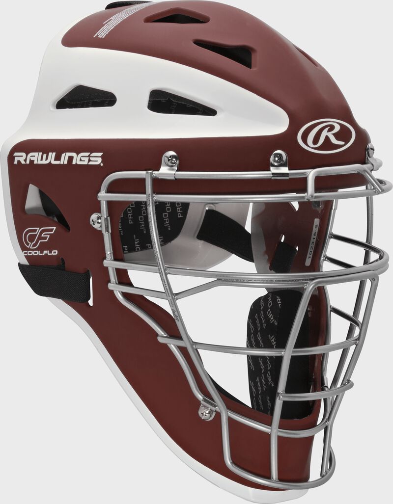 Front right of a cardinal/white CHVEL Rawlings Velo adult catcher's helmet
