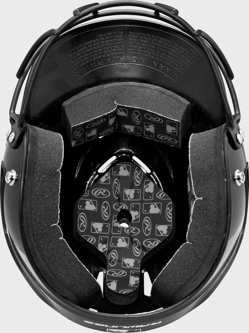 Inside padding of a black RCFHFG Rawlings Coolflo batting helmet with facemask