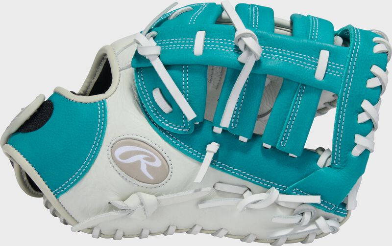 Thumb of a white/teal Shut Out 12-inch Fastpitch Softball 1st Base Mitt