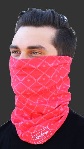 A guy wearing a red Rawlings adult multi-functional head and face cover around his mouth and nose - SKU: RC40005-600