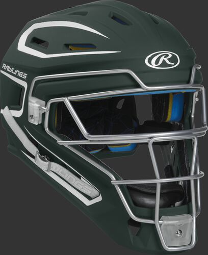 Front right of a dark green CHMCHS Rawlings Mach catcher's helmet