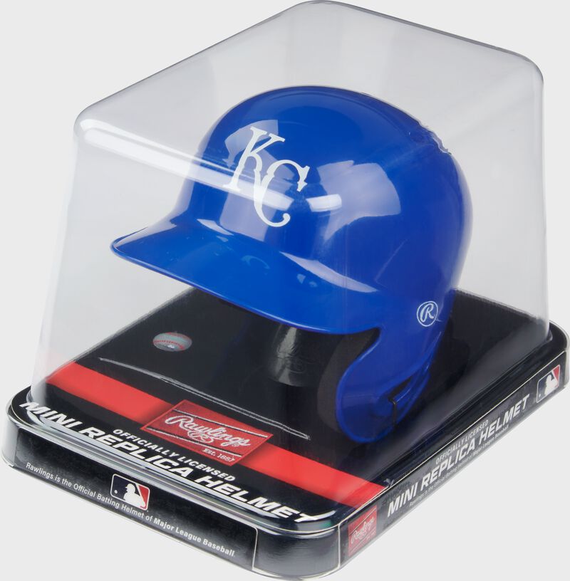 A blue Kansas City Royals mini helmet in a clear packaging case