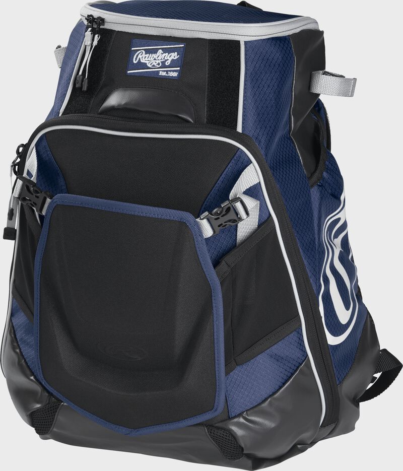 Front left of a navy VELOBK Rawlings Velo equipment backpack with an Oval R logo on the side compartment