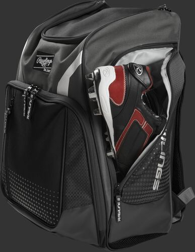 A cleat in the side cleat pocket of a gray Legion baseball backpack - SKU: LEGION-GR