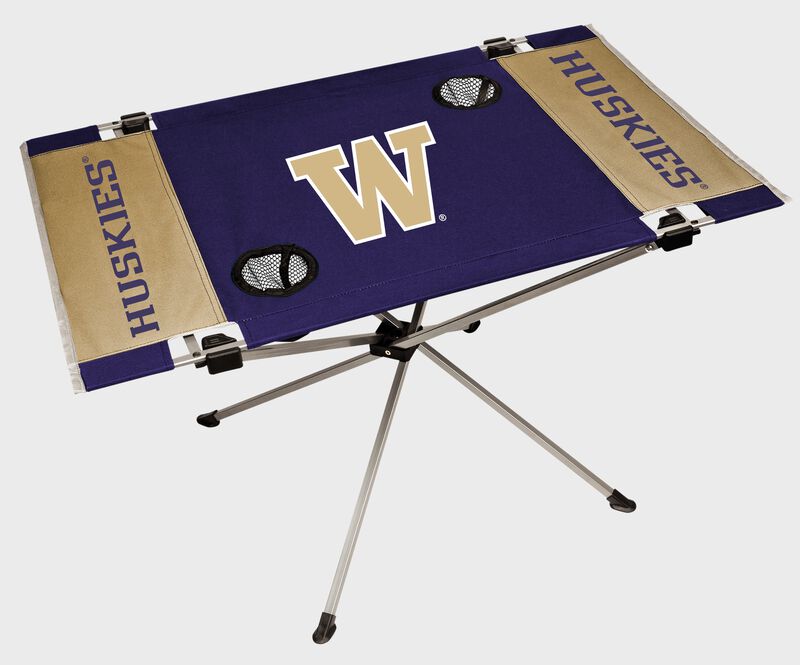 A Washington Huskies endzone table with a large team logo in the middle loading=