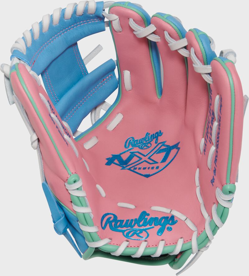 Pink palm of a Rawlings Exclusive Rawlings NXT Series 11.5" Infield Glove with columbia blue stamping and white laces