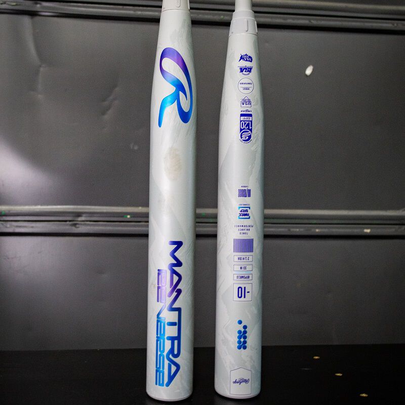 Picture of two gray Rawlings Mantra Reverse fastpitch softball bats showing both sides of the barrel