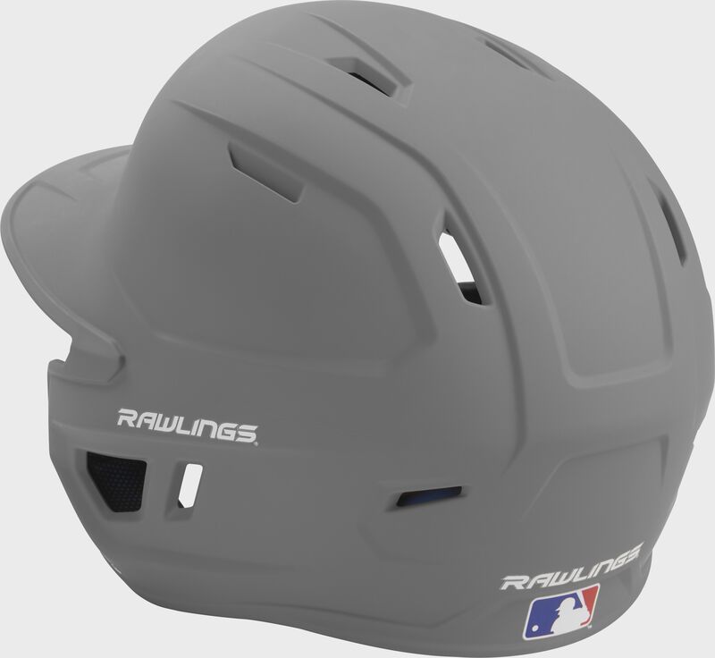 Back left view of a matte silver MACH series batting helmet with air vents