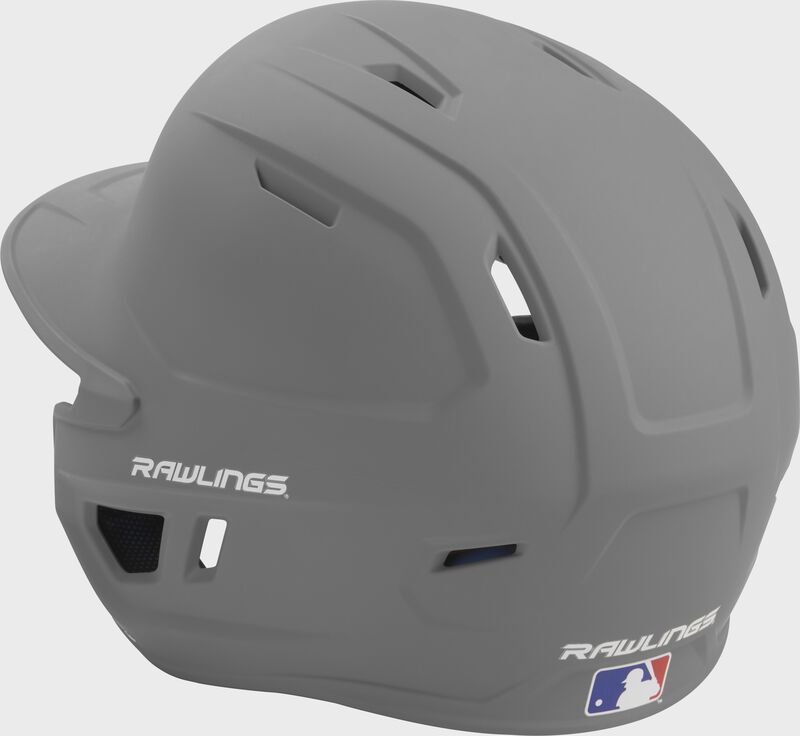 Back left view of a matte silver MACH series batting helmet with air vents image number null