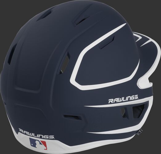 Back right of a two-tone matte navy/white MACH Rawlings Junior size batting helmet