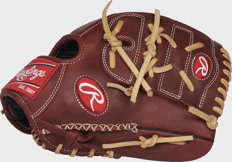 A burgundy Heart of the Hide 11.75 in infield/pitcher's glove with a 2-pieces solid web and hand sewn welting - SKU: PRO1175-9PRPRO
