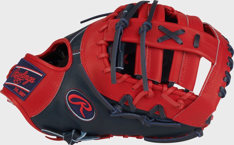 Thumb of a navy/scarlet Vladimir Guerrero Jr. Pro Preferred 13-Inch 1st Base Mitt with a single post, double bar web