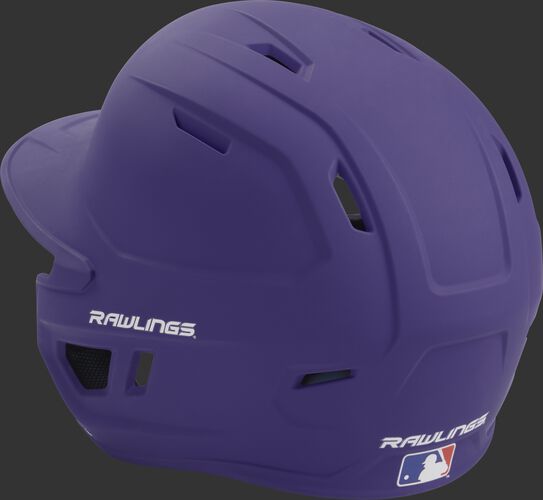 Back left view of a matte purple MACH series batting helmet with air vents