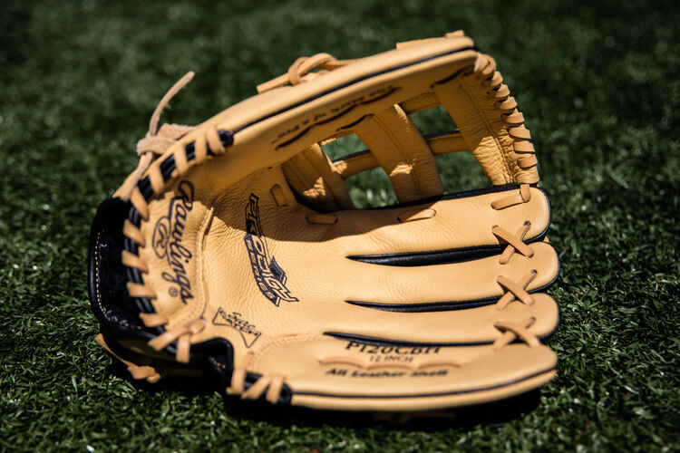 Camel palm of a Rawlings Prodigy glove on a field - SKU: P120CBH
