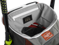 Top compartment of an orange Impulse bag with a phone, keys and black "The Mark of a Pro" patch - SKU: IMPLSE-BO image number null
