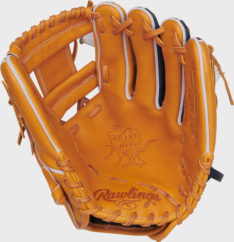 Tan palm of a Rawlings Heart of the Hide infield glove with tan laces