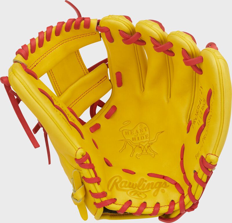 Palm of a yellow Heart of the Hide ContoUR Fit 11.5-Inch Infield Glove with scarlet laces