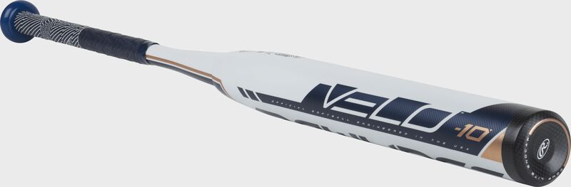 3/4 view of a FP9V10 Rawlings Velo fastpitch bat with a white barrel and black end cap