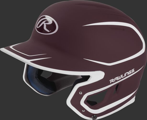 Left angle view of a Rawlings MACH Junior helmet with a two-tone matte maroon/white shell